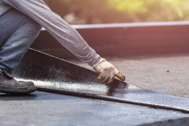Professional Waterproofing technician working in Woodbury, MN